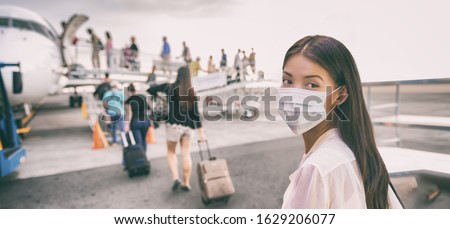 COVID-19 Travel Airport Asian woman tourist boarding plane for holiday wearing face mask. PPE Corona virus Coronavirus negative test and vaccine passport banner panoramic.
