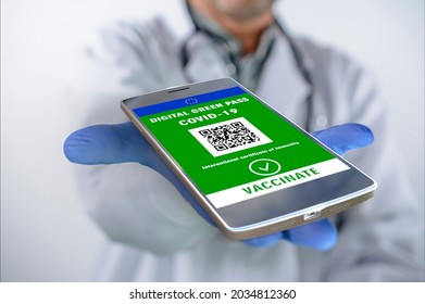 COVID-19 vaccination passport on mobile phone for travel, Doctor holds smartphone with health certificate application, coronavirus digital pass. Digital Green Pass
