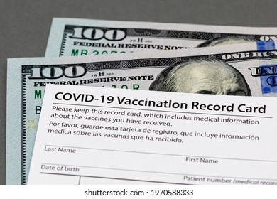 Covid-19 Vaccination Record Card And Cash Money. Fake, Vaccine Card Fraud And Forgery Concept