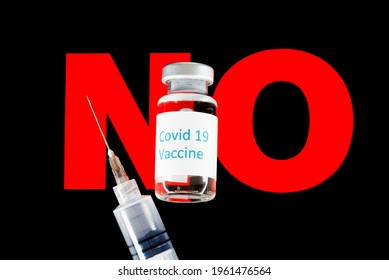 Covid-19 Vaccine Bottle With Hypodermic Needle On A NO Sign To Indicate Anti-vaccine