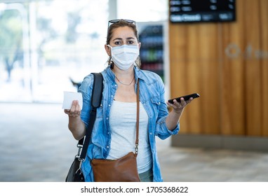 COVID-19 Worldwide Borders Closures.Traveler With Face Mask Stuck In Airport Terminal After Being Denied Entry To Other Countries. Passenger Stranded In Airport On His Travel Back To Home Country.