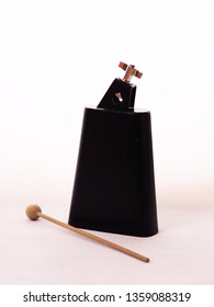 Cow bell with a stick