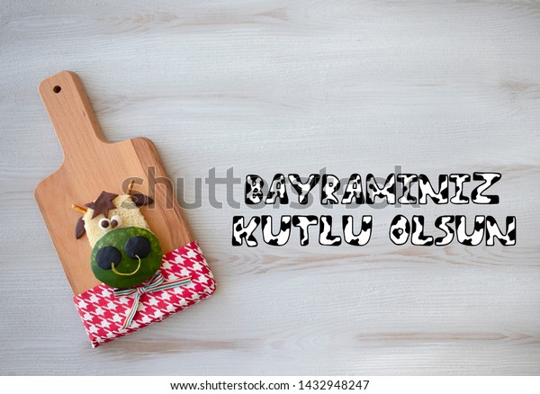 cow food styling for sacrifice feast with Turkish\
happy eid message