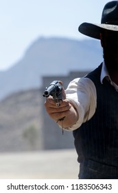 Cowboy Aiming With His Pistol Or Gun