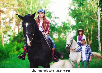Cowboy Girl Rides A Horse In The Forest And Family On Farm