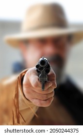 Cowboy Gunman Aiming A Pistol Revolver Duel West Western