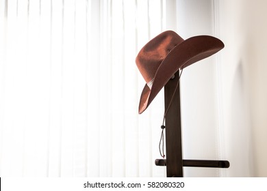 cowboy hats hanging on wall