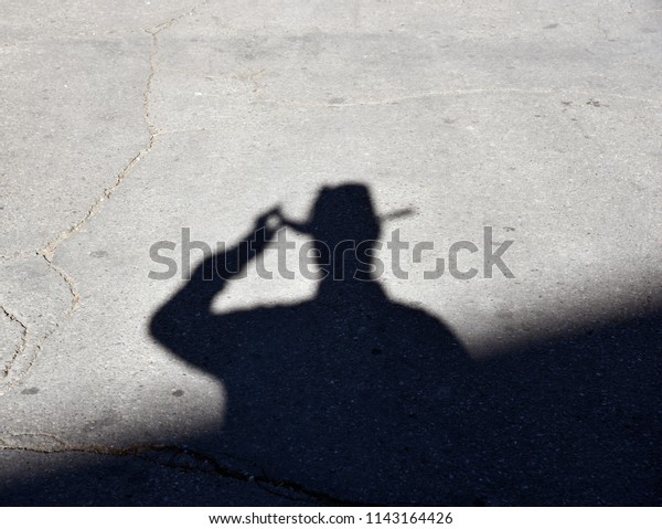 Cowboy hat shadow\
silhouette