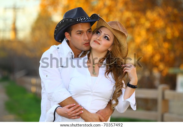 Cowboy His Cowgirl Romantically Kissing Stock Photo (Edit Now) 70357492