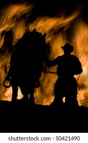 A Cowboy With His Horse And A Fire Background