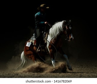 cowboy on a horse during the reining element of western