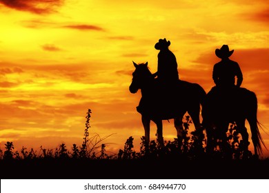 Cowboy on horseback. ranch