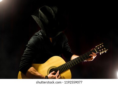 Cowboy playing guitar 