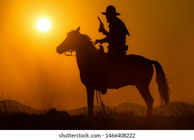 Cowboy Riding Horse Carrying Gun Stock Photo 1340165780 | Shutterstock