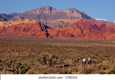 Cowboys Riding Into The Sunset. Red Rock Canyon, Las Vegas, Nevada