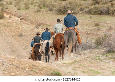 Cowboys Riding Out In Jig Line To Do The Days Work