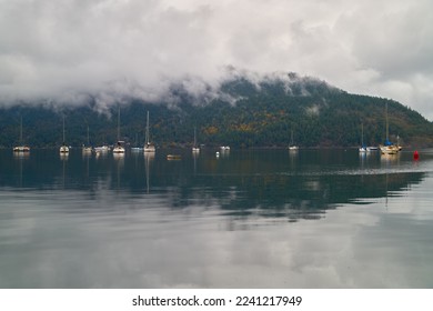 Cowichan Bay Sailboats Misty Morning. Boats anchored on a misty morning on Cowichan Bay, Vancouver Island, British Columbia.

                                - Powered by Shutterstock