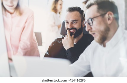 Coworkers Photo In Sunny Office.Project Managers Team Work New Idea.Business Crew Working With Startup Modern Studio.Desktop Computer On Table,showing Presentation.Blurred,film Effect. Horizontal