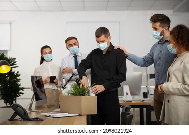 Coworkers Saying Goodbye To Dismissed Man In Office