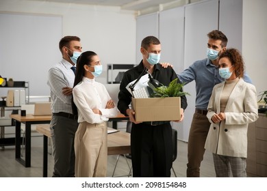 Coworkers Saying Goodbye To Dismissed Man In Office