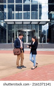 Coworkers Talking About Business Outdoors Office