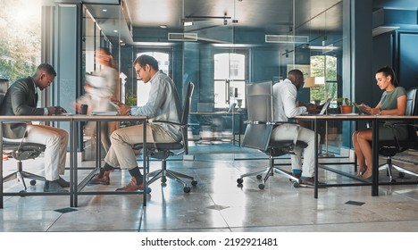Coworking space, office and sharing desk in corporate workplace. Diversity, efficiency and modern working environment for inclusive company. Start up and motion blur of fast and busy employees - Shutterstock ID 2192921481