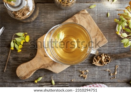 Cowslip tea on a table, top view