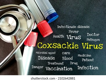 coxsackie virus words on blackboard with medical tools. coxsackie virus disease concept