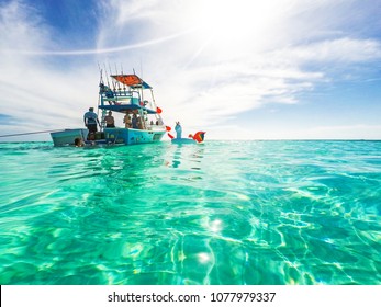 Cozumel, Mexico - April 19, 2018: Group Of Friends Relaxing Together On A Party Boat Tour Of The Carribean Sea