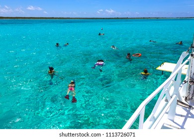 Cozumel, Mexico - Group Of Friends Snorkeling Together On A Party Boat Tour Of The Carribean Sea