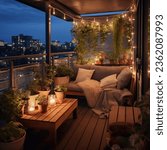 A cozy apartment balcony filled with plants and string lights