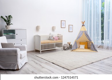 Cozy Baby Room Interior With Play Tent And Toys