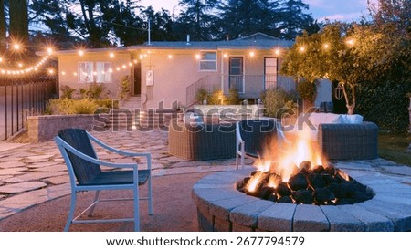 Cozy Backyard Fire Pit at Twilight with String Lights