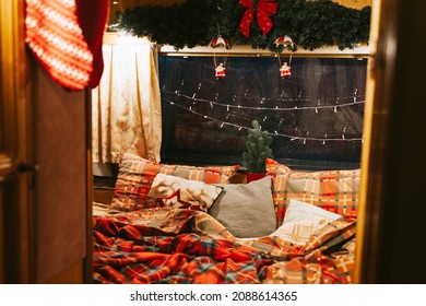 Cozy Bedroom Interior In Trailer Of Mobile Home Or Recreational Vehicle, Concept Of Family Local Travel In Native Country On Caravan Or Camper Van And Camping Life In Winter, Christmas And New Year