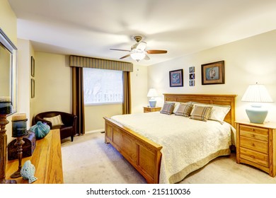 Cozy Bedroom In Soft Ivory Tone With Wooden Furniture Set