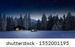 cozy blockhouse in wintertime at night