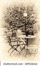 Cozy Cafe Terrace In Retro Style. Bruges, Belgium 