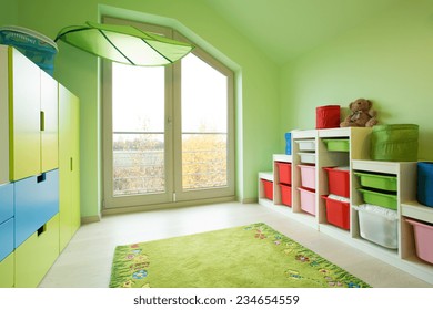 Cozy Child's Room With Green Painted Walls