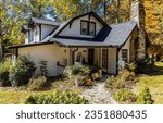 Cozy cottage in autumn scene. Cottage house. Cozy cottage. Cottage in autumn