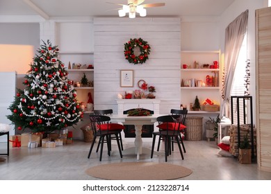 Cozy Dining Room Interior With Christmas Tree And Festive Decor