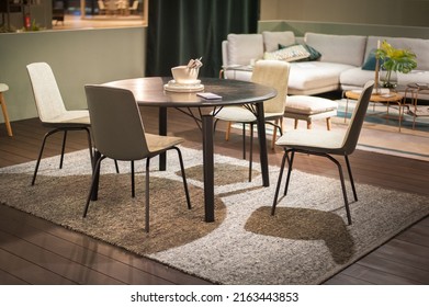 cozy dining set of table and upholstered chairs for four people