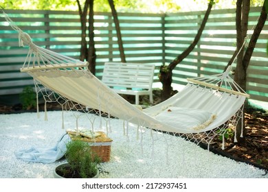 Cozy Exterior Backyard. Hammock In Boho Style Hanging On Tree. Concept Of Recreation Outdoor. Comfortable Hammock Hanging Hanging On Tree In Summer Garden. Cozy Hygge Place For Weekend Relax In Yard. 