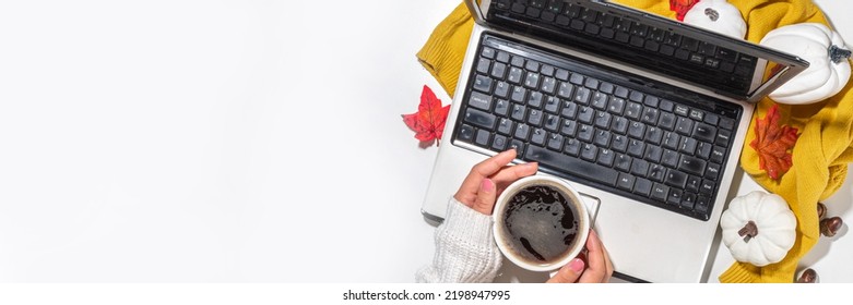 Cozy Fall Background With Coffee Cup, Tablet Notebook, Ear-pods, White, Orange Pumpkins, Autumn Leaves Decor On White Home Office Table Background. Autumn Still Life Composition Flatlay