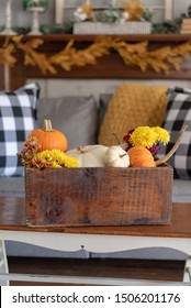 Cozy Fall Home Interior With Vintage Crate Of Pumpkins