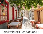 The cozy Greek city of Nafplion in the summer, blooming streets and restaurants. The first capital of Greece.