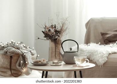 Cozy home composition with tea in a Scandinavian style home interior. - Powered by Shutterstock