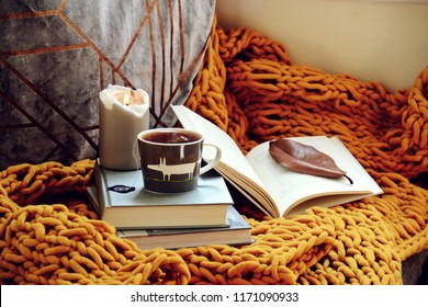 Cozy Home With Cup Of Tea With Blanket And Book. Hygge Home Interior 