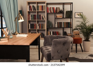 Cozy Home Library Interior With Collection Of Different Books On Shelves