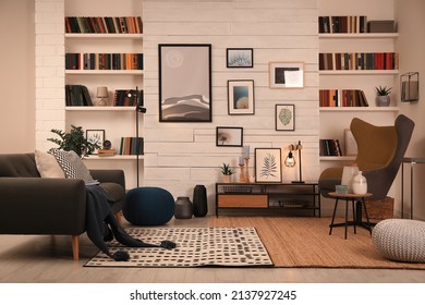 Cozy Home Library Interior With Comfortable Furniture And Collection Of Different Books On Shelves