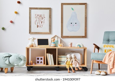 Cozy Interior Of Child Room With Mint Armchair, Brown Mock Up Poster Frame, Toys, Teddy Bear, Dolls, Plush Animal, Decoration. White Wall. Warm Kid Space. Template.